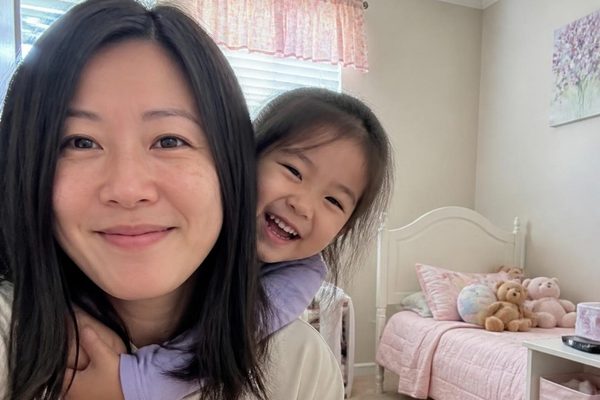 Mother and daughter in the daughter's new bedroom